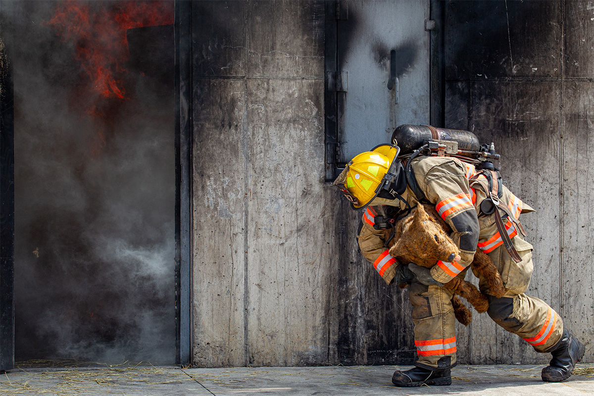 Fire Fighter carrying K9