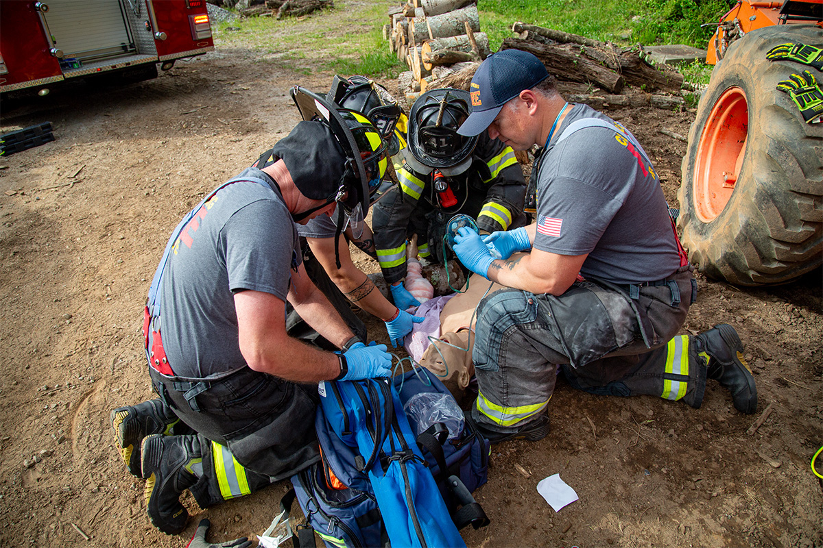 Group of Fire Fighters with Tommanikin